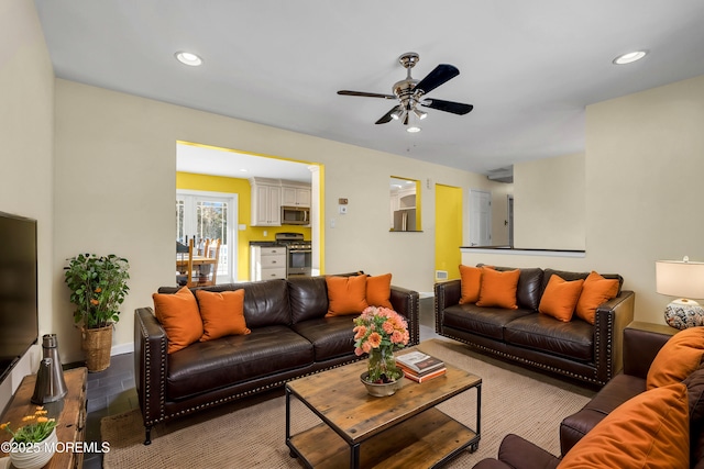 living room featuring ceiling fan