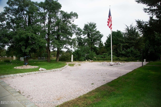 583 Cedar Ave, West Long Branch, NJ 07764 - view of community with a lawn