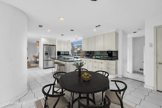 view of tiled dining space