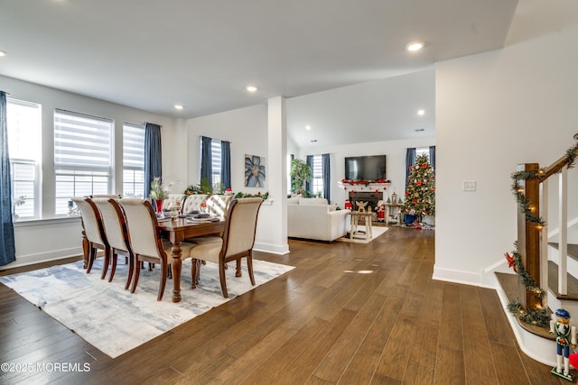 dining space featuring dark wood-type flooring