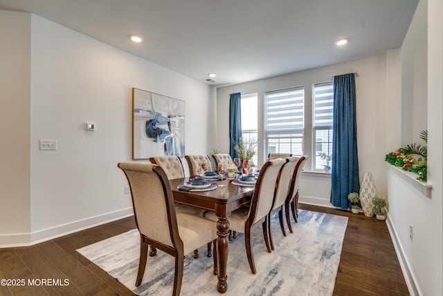 dining space with dark wood-type flooring