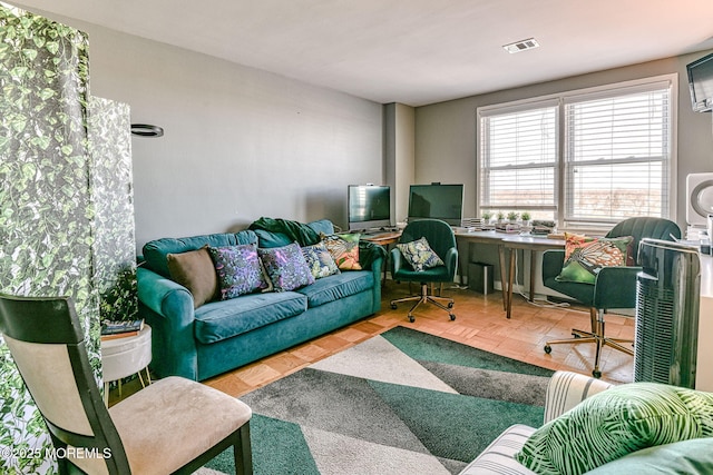 living room with parquet flooring