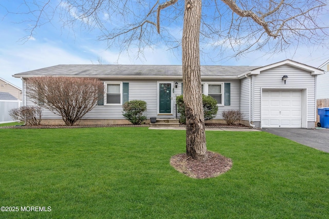 single story home with a front lawn and a garage