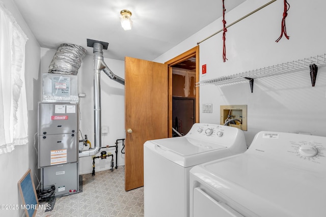 washroom with independent washer and dryer and heating unit