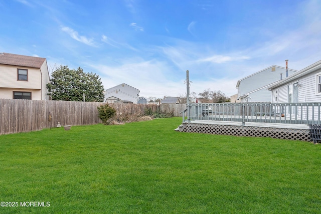 view of yard featuring a deck