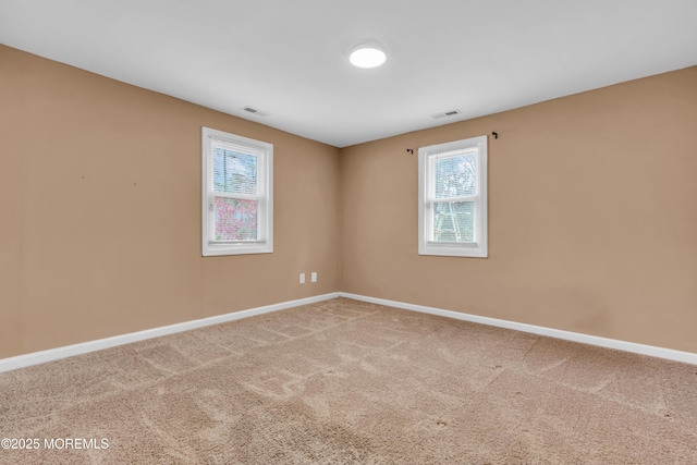 view of carpeted spare room