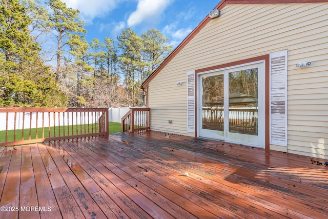 deck featuring a yard