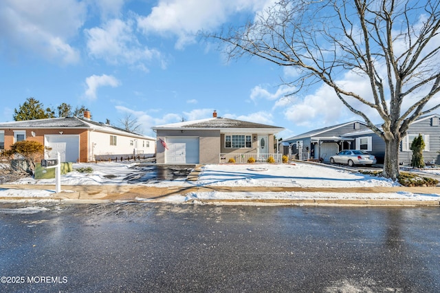 view of front of property featuring a garage