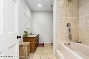 bathroom featuring tile patterned floors and vanity