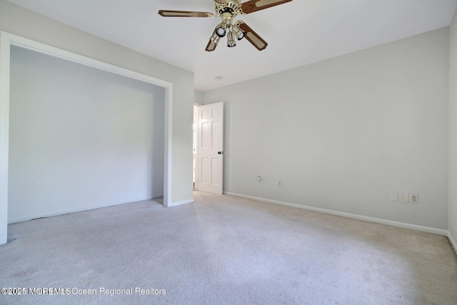 spare room with ceiling fan