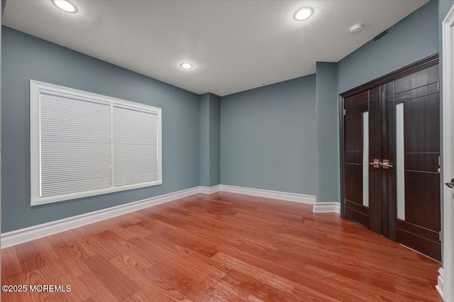 empty room featuring light hardwood / wood-style floors