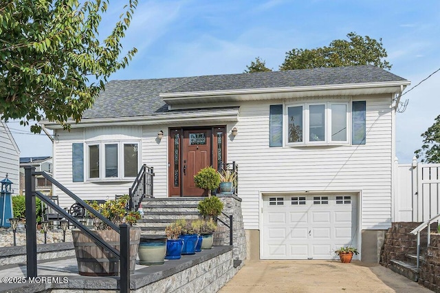 view of front of home with a garage