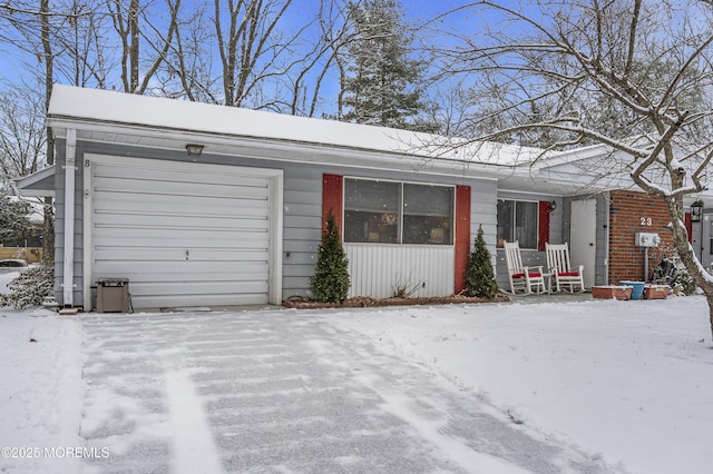 view of front of property featuring a garage