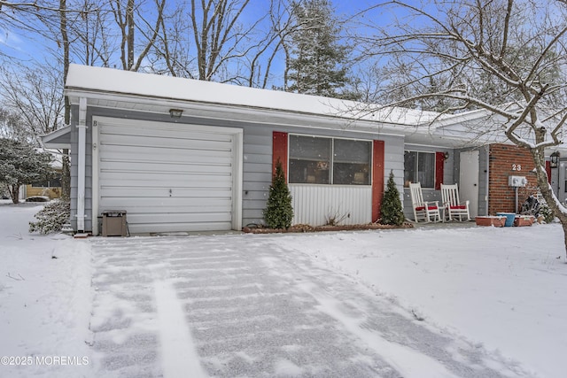 view of front of home with a garage