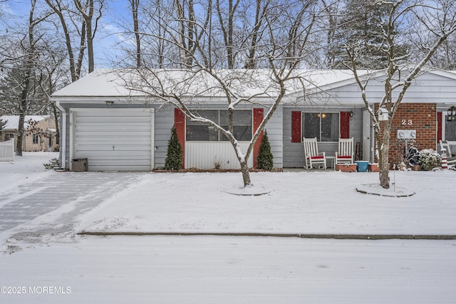 single story home featuring a garage