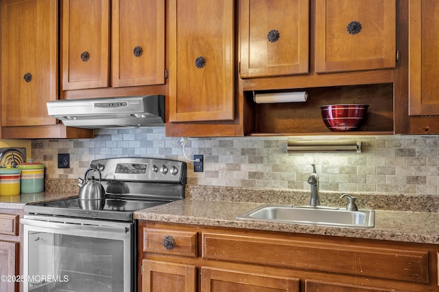 kitchen featuring tasteful backsplash, extractor fan, stainless steel electric stove, and sink