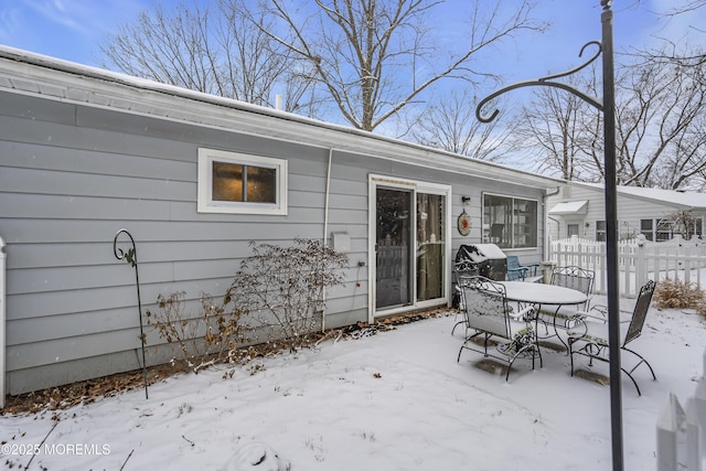 view of snow covered patio