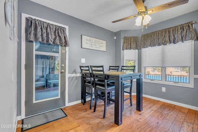 dining room featuring ceiling fan and light wood-type flooring