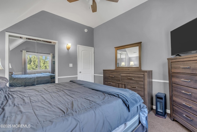 bedroom with light carpet, vaulted ceiling, and ceiling fan