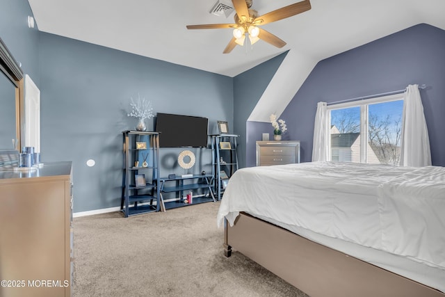 carpeted bedroom with ceiling fan and lofted ceiling