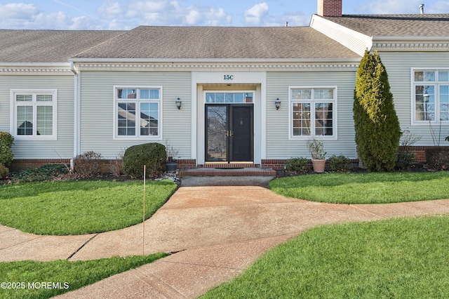 view of front of house with a front yard