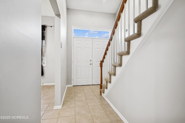 view of tiled foyer entrance