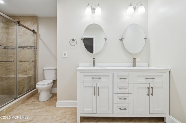 bathroom featuring toilet, tile patterned flooring, a shower with shower door, and vanity