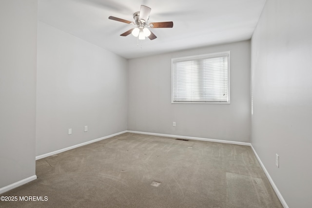 unfurnished room featuring carpet floors and ceiling fan