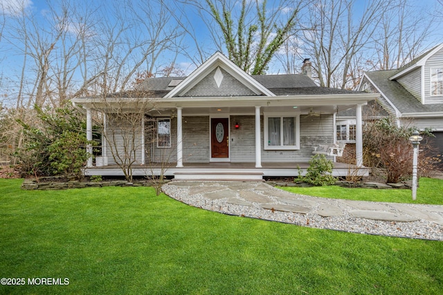 view of front of property with a front lawn and a porch