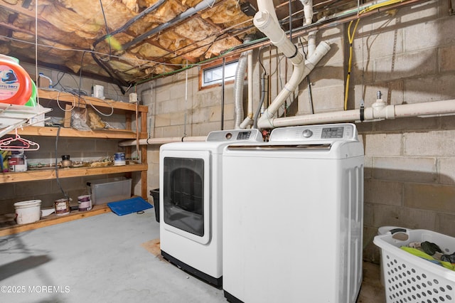 clothes washing area featuring washing machine and dryer