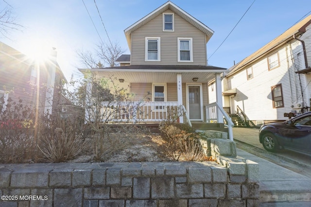 view of front property featuring a porch