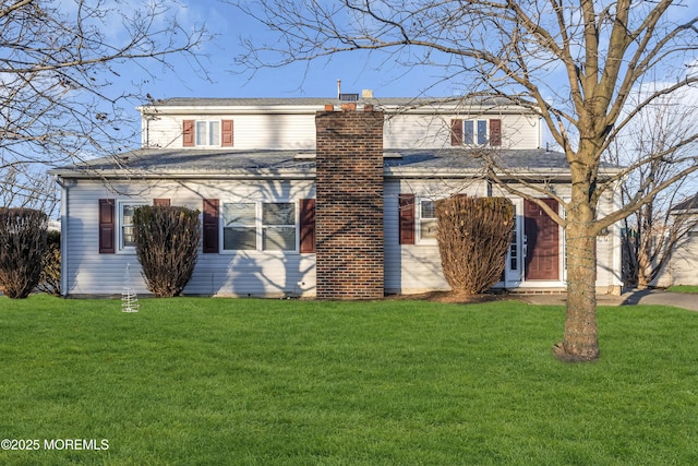 view of front of house with a front lawn