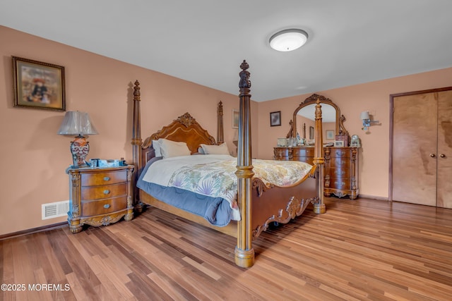 bedroom featuring hardwood / wood-style flooring