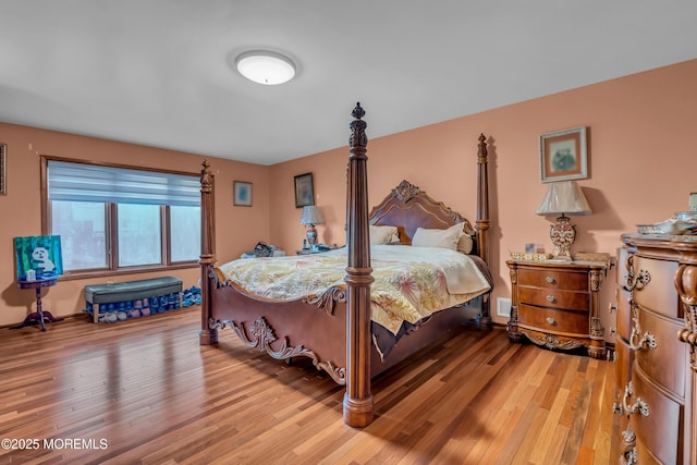 bedroom featuring hardwood / wood-style flooring