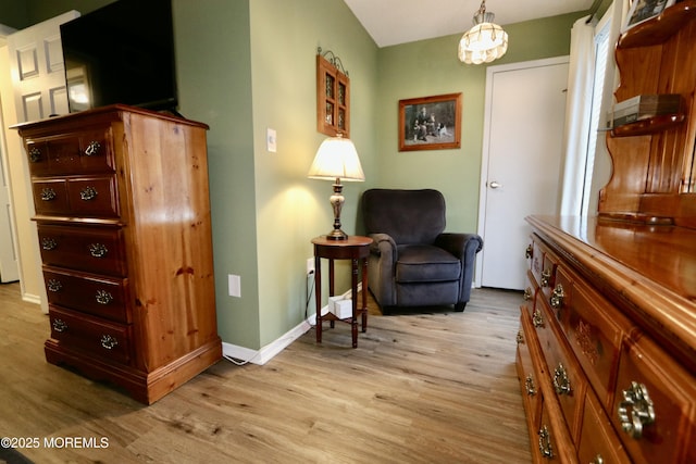 sitting room with light hardwood / wood-style flooring