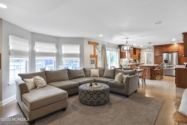 living room with a chandelier