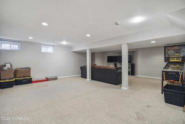 basement featuring light carpet