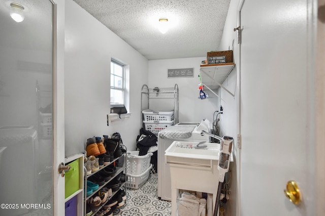 office space with light tile patterned flooring and a textured ceiling