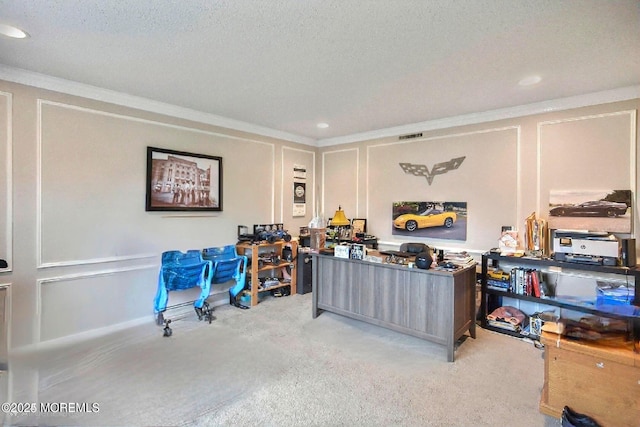 home office featuring a textured ceiling and crown molding