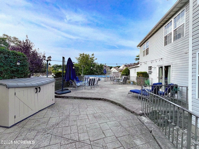 view of patio / terrace with a swimming pool