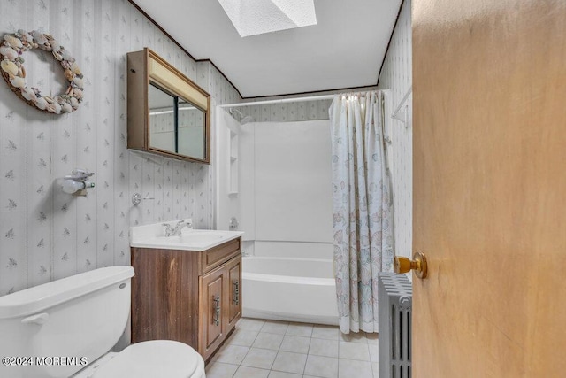 full bathroom with shower / bath combination with curtain, a skylight, radiator, tile patterned flooring, and toilet