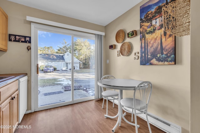 dining room featuring light hardwood / wood-style flooring