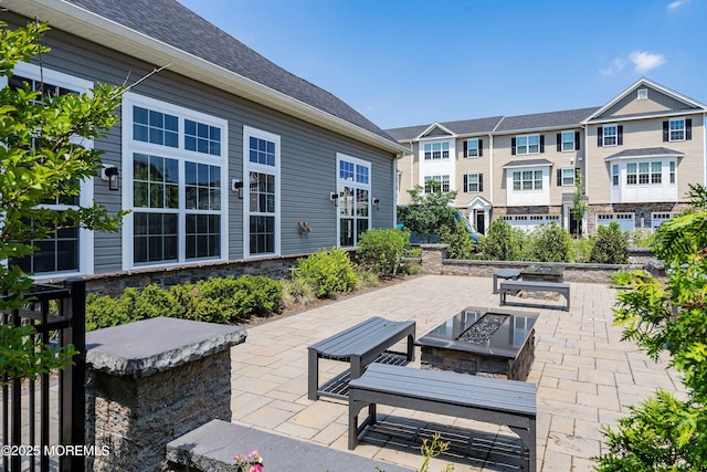 view of patio featuring a fire pit