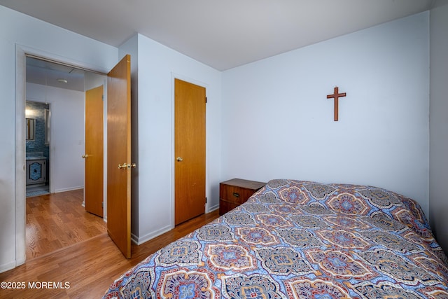 bedroom featuring light wood-type flooring