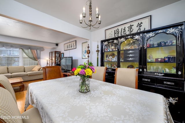 dining room with a chandelier