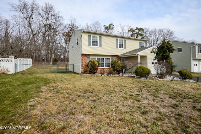 view of front of home with a front yard