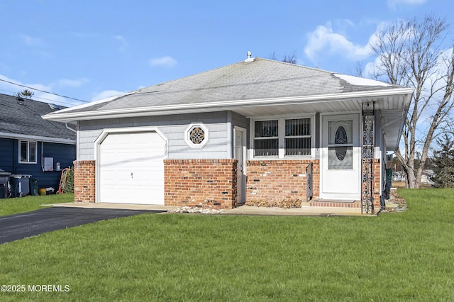 single story home featuring a front yard and a garage