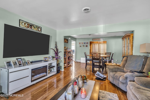 living room featuring light hardwood / wood-style floors