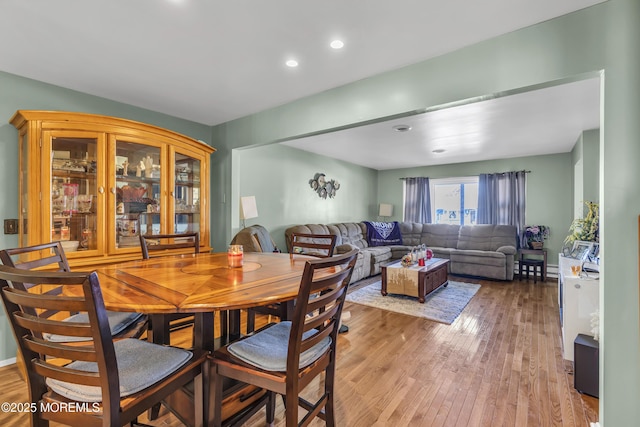 dining room with light wood-type flooring