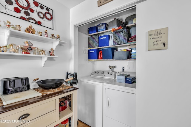 laundry room featuring independent washer and dryer